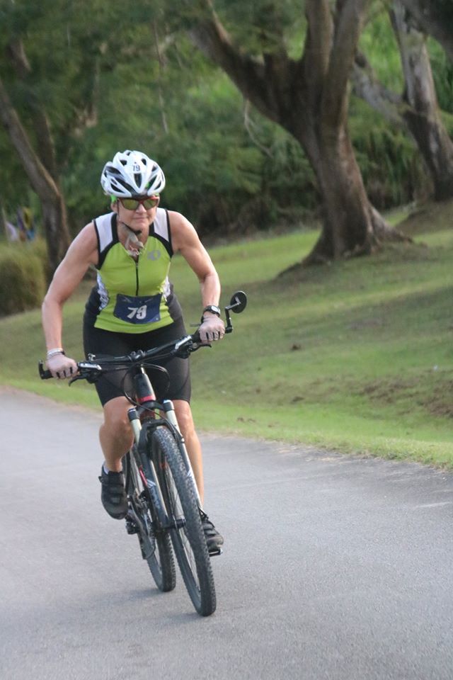 A mountain biker riding a trail on Saipan